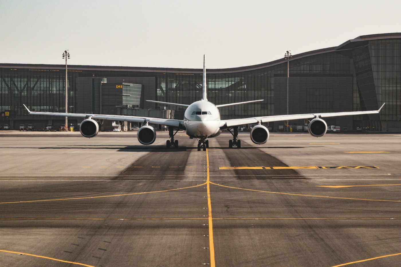 A four-engine airliner on the tarmac